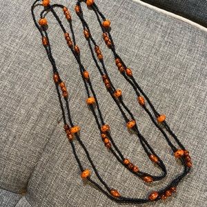 Two long beaded strands